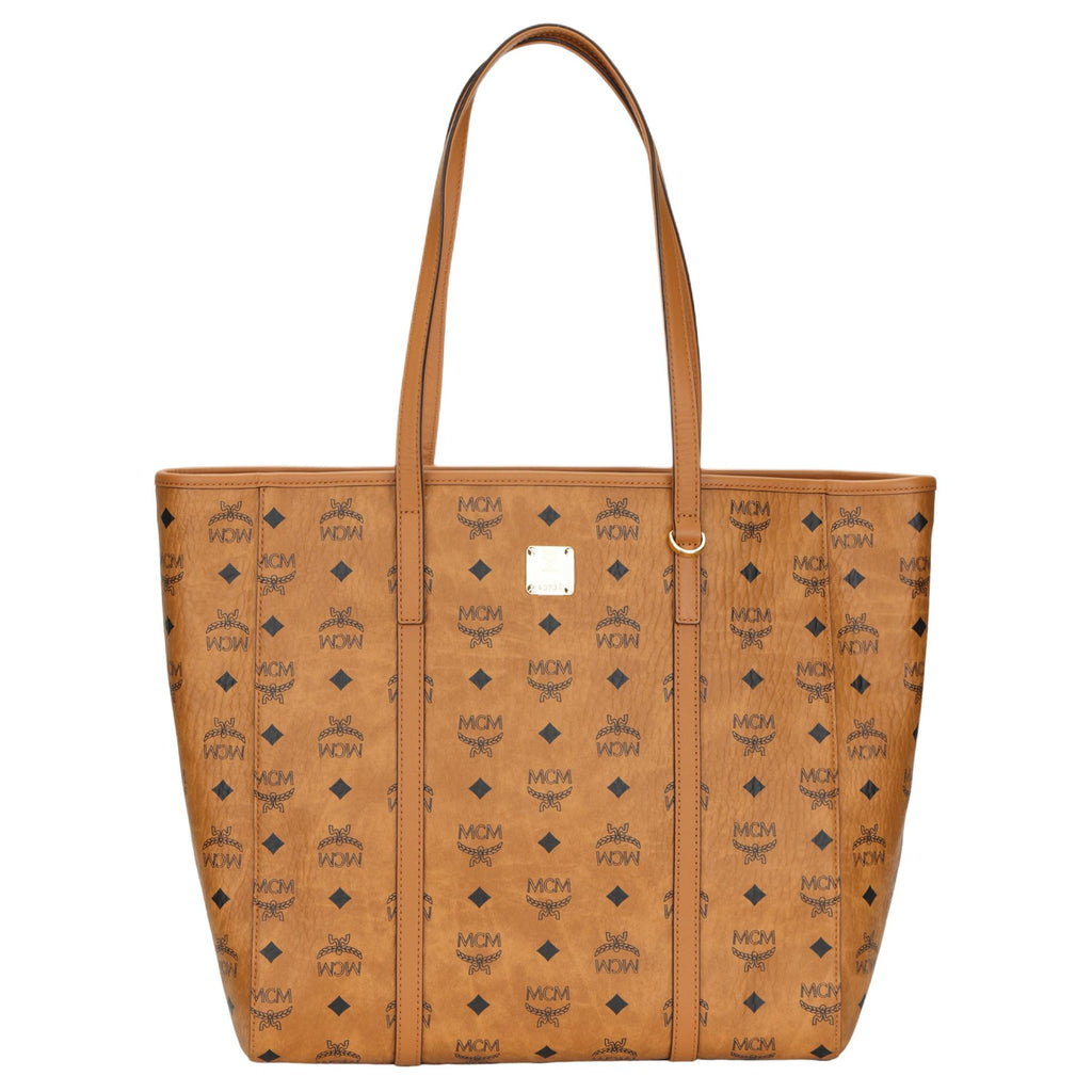 MCM Toni Medium Tote Bag in Visetos Monogram Faux Leather & Calf Leather – Cognac