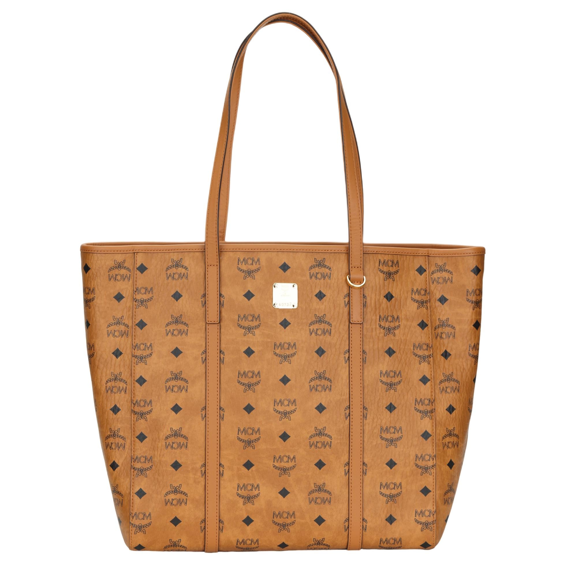 MCM Toni Medium Tote Bag in Visetos Monogram Faux Leather & Calf Leather – Cognac