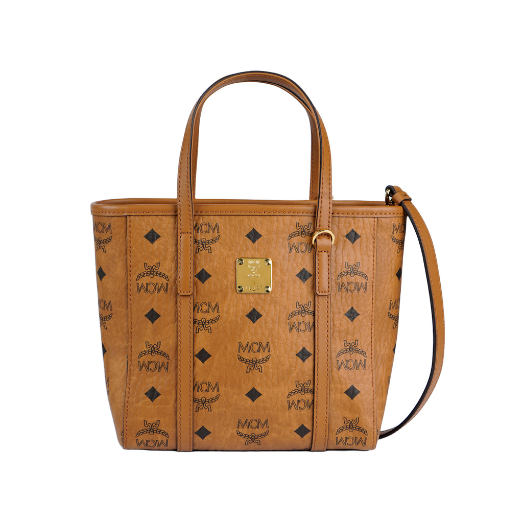 MCM Toni Top-Zip Shopper in Visetos Monogram Canvas Mini Crossbody Tote Bag – Cognac