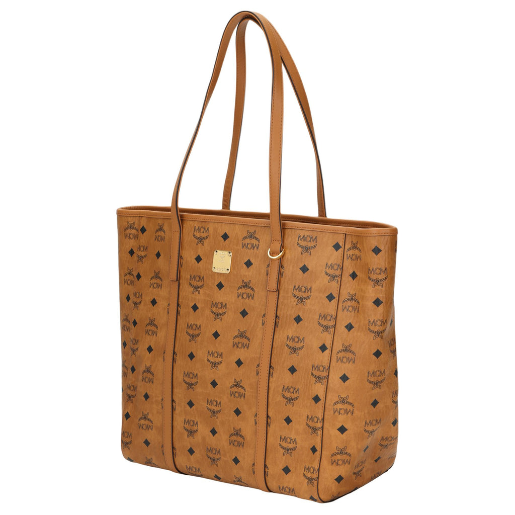 MCM Toni Medium Tote Bag in Visetos Monogram Faux Leather & Calf Leather – Cognac