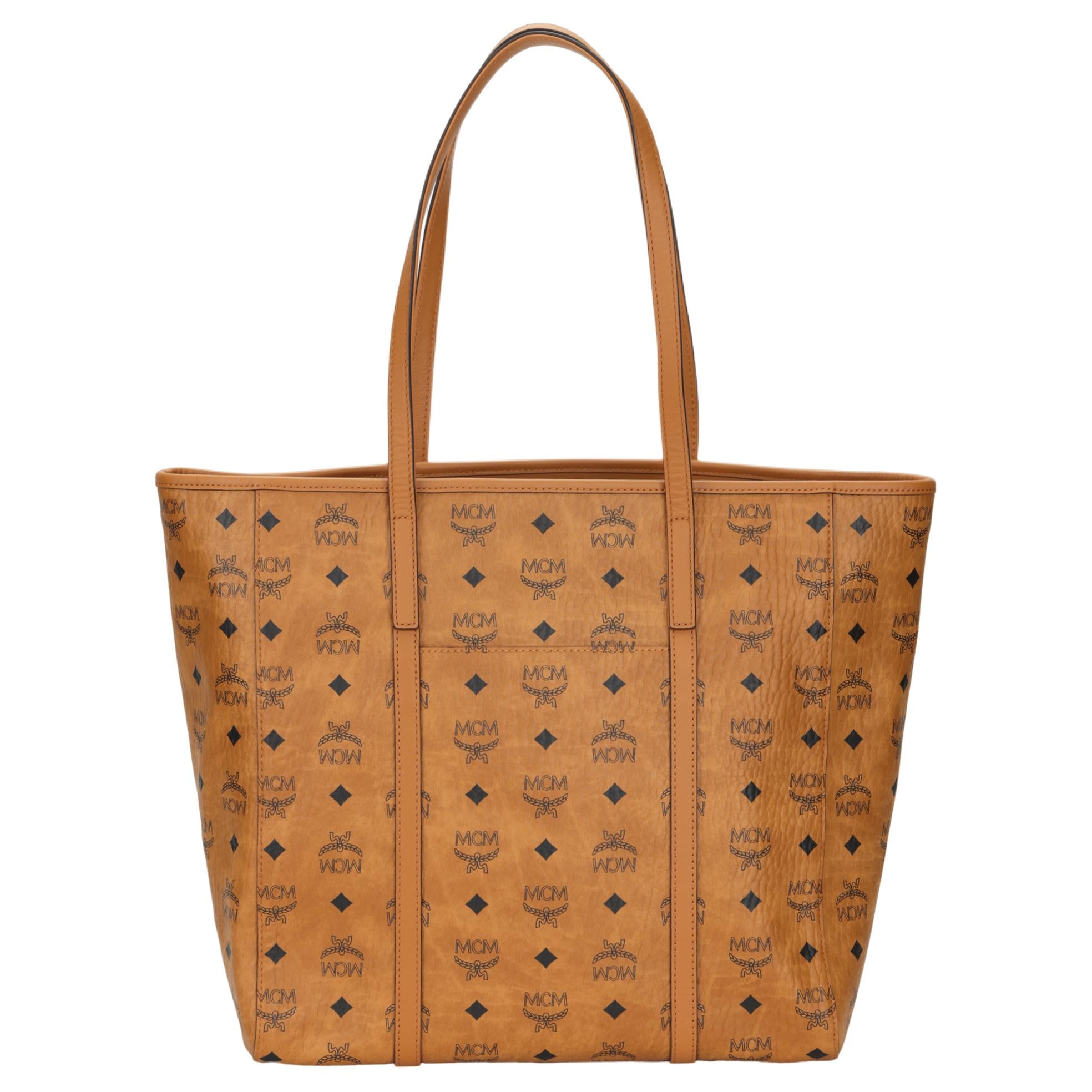 MCM Toni Medium Tote Bag in Visetos Monogram Faux Leather & Calf Leather – Cognac