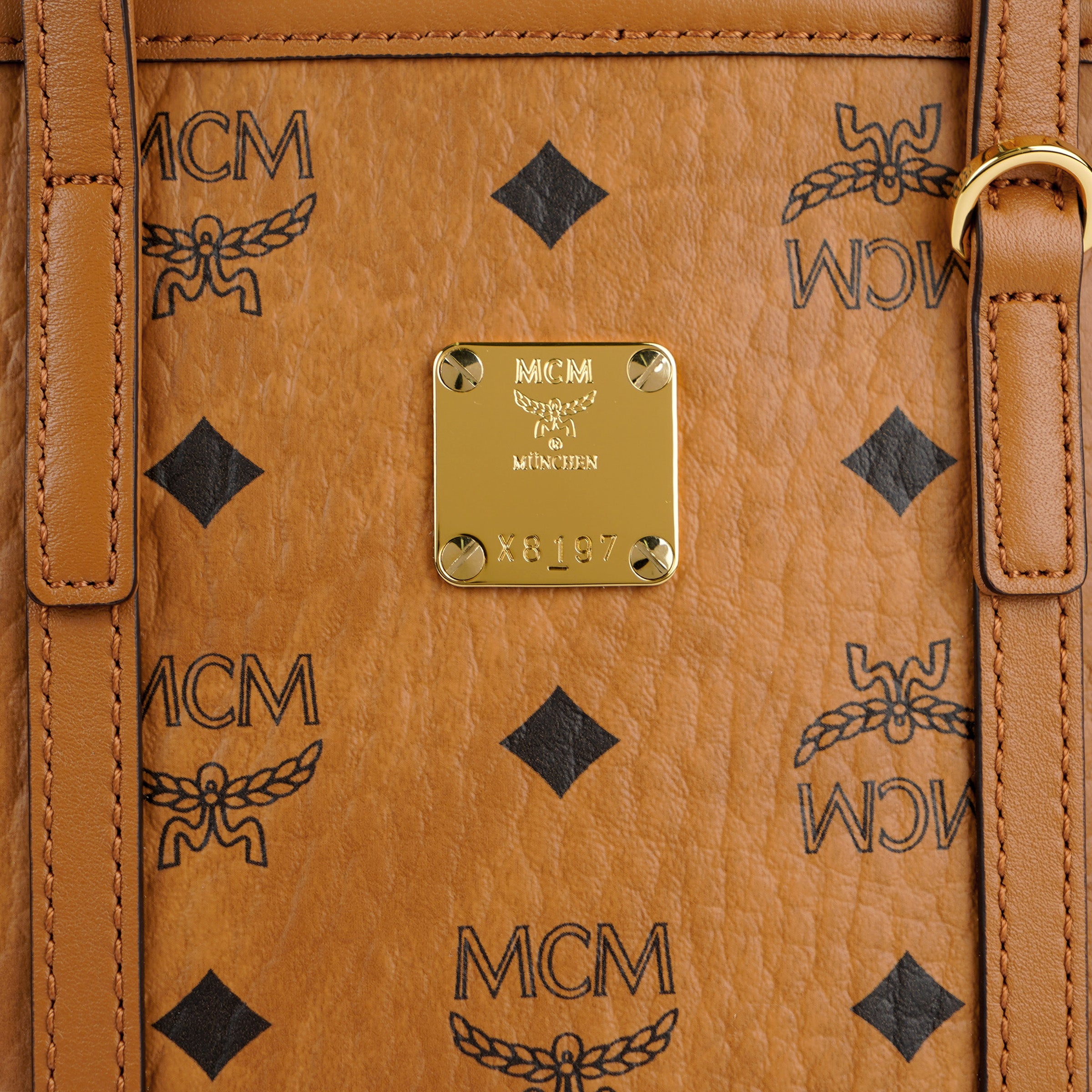 MCM Toni Top-Zip Shopper in Visetos Monogram Canvas Mini Crossbody Tote Bag – Cognac