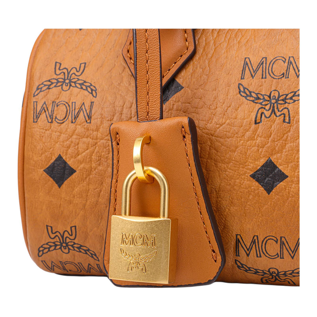 MCM Ella Mini Visetos Monogram Boston Crossbody Bag with Gold-Tone Lock Charm – Cognac Brown
